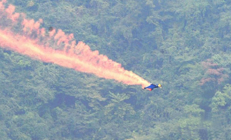 The wingsuit pilots will race down the famed Tianmen Mountain