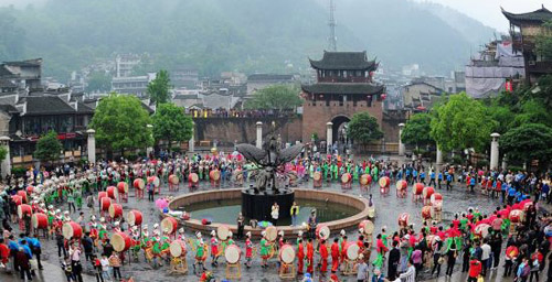 The Miao People of Fenghuang Ancient Town Dances to Welcome Tourists