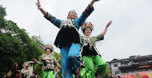 The Miao People of Fenghuang Ancient Town Dances to Welcome Tourists