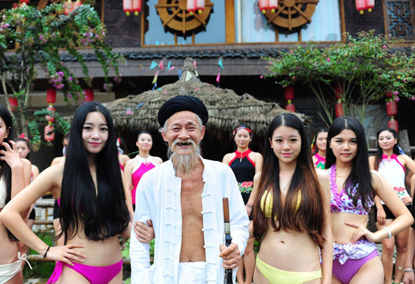 Bikini Mud-wrestling Boosts Travel to Scenic Central China